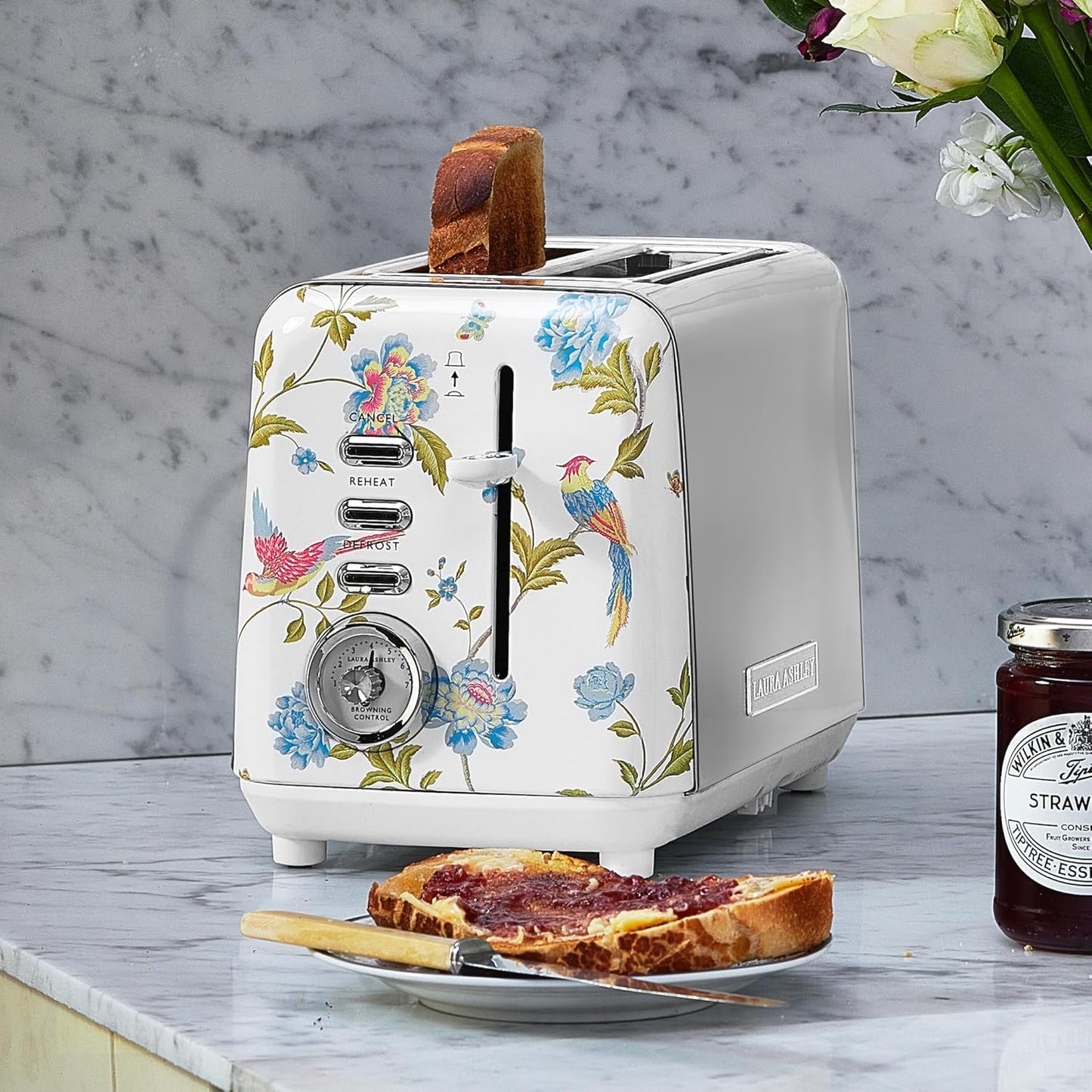Torradeira 2 Fatias em Aço Inox Laura Ashley Branco com estampa floral Elveden, Slots Largos, 7 Níveis, Funções Descongelar, Reaquecer, Rack para Croissants, 850W, 110V